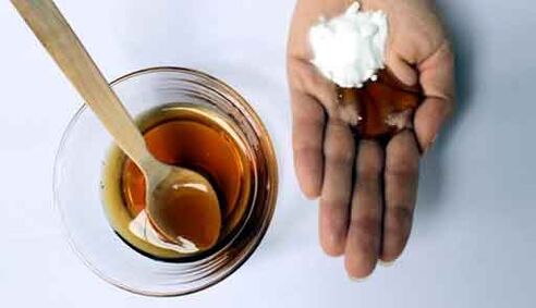 A mixture of soda powder with honey to increase a member